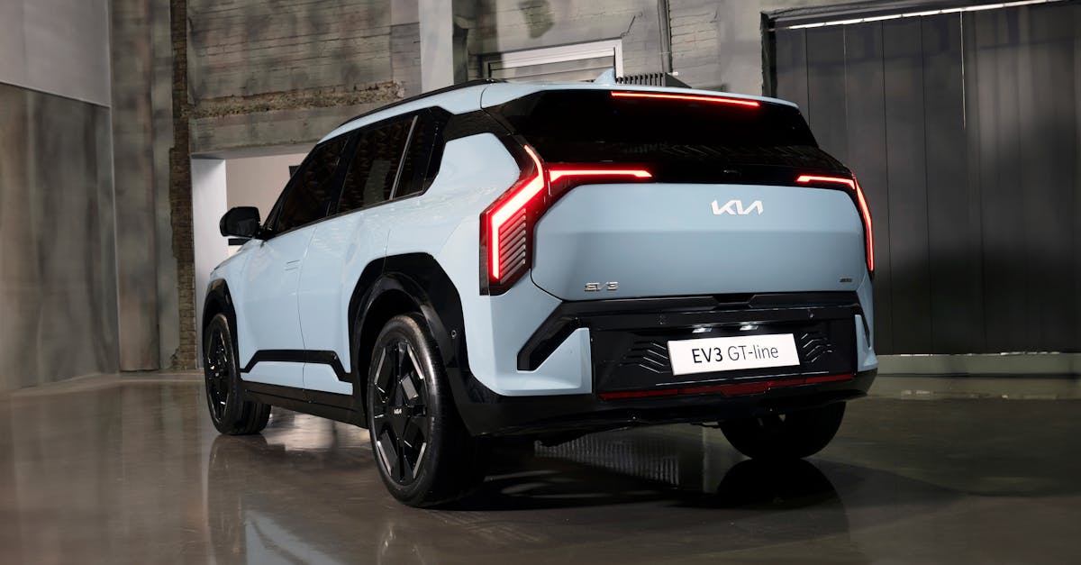 Sleek Kia EV3 GT-Line showcased in a modern interior setting, highlighting its futuristic design.